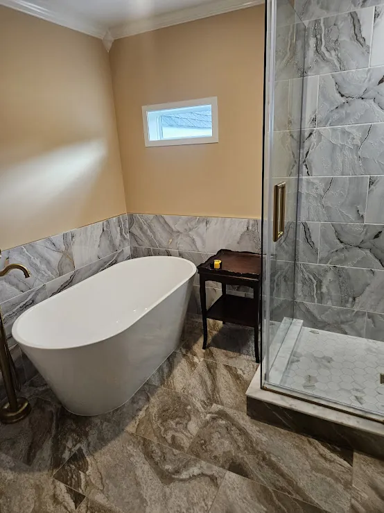 Freestanding tub and glass shower